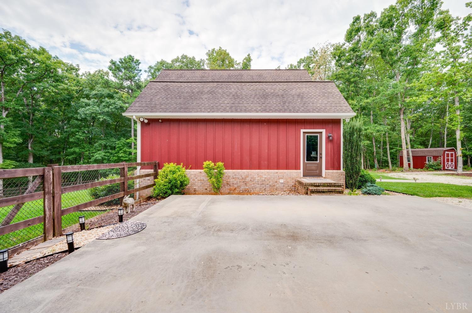 2842 Chilton Road Appomattox, VA 24522 - Photo 47 of 75 a front view of a house with a yard and garage
