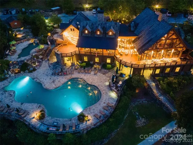a view of an outdoor space pool patio and outdoor seating