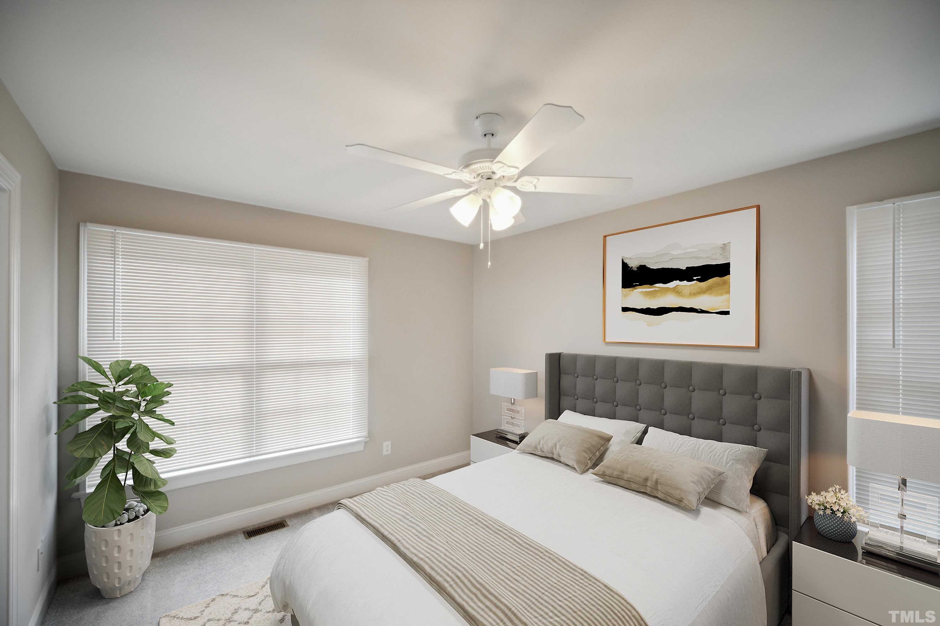 2131 Antioch Church Road Roxboro, NC 27574 - Photo 14 of 26 a bedroom with a large bed and a window