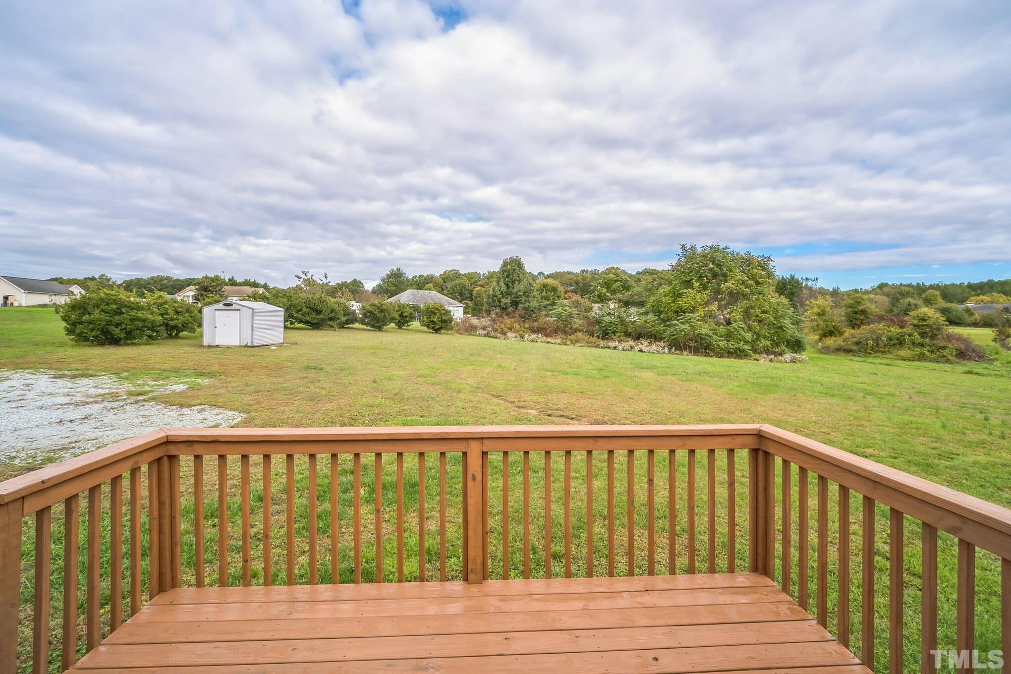 2131 Antioch Church Road Roxboro, NC 27574 - Photo 25 of 26 a balcony with an ocean view