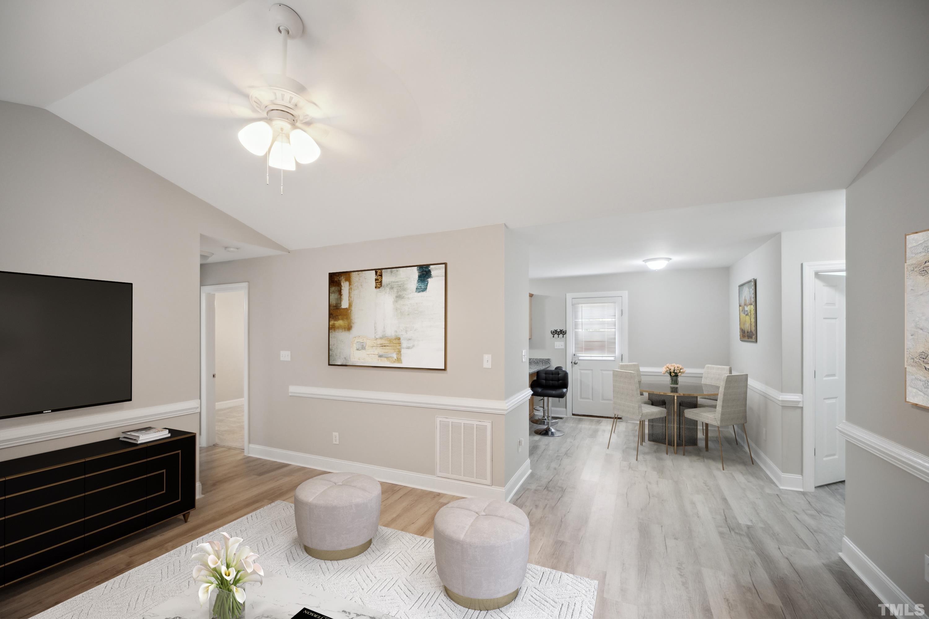 2131 Antioch Church Road Roxboro, NC 27574 - Photo 7 of 26 a living room with furniture and a flat screen tv