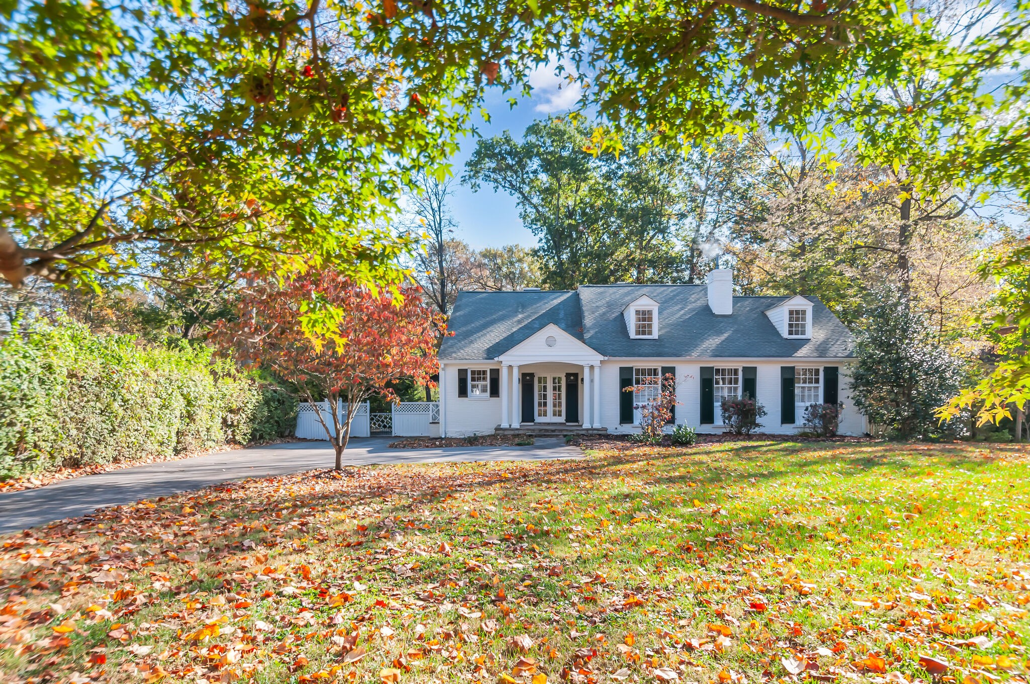 4206 Sneed Road Nashville, TN 37215 - Photo 1 of 56 a front view of a house with a yard