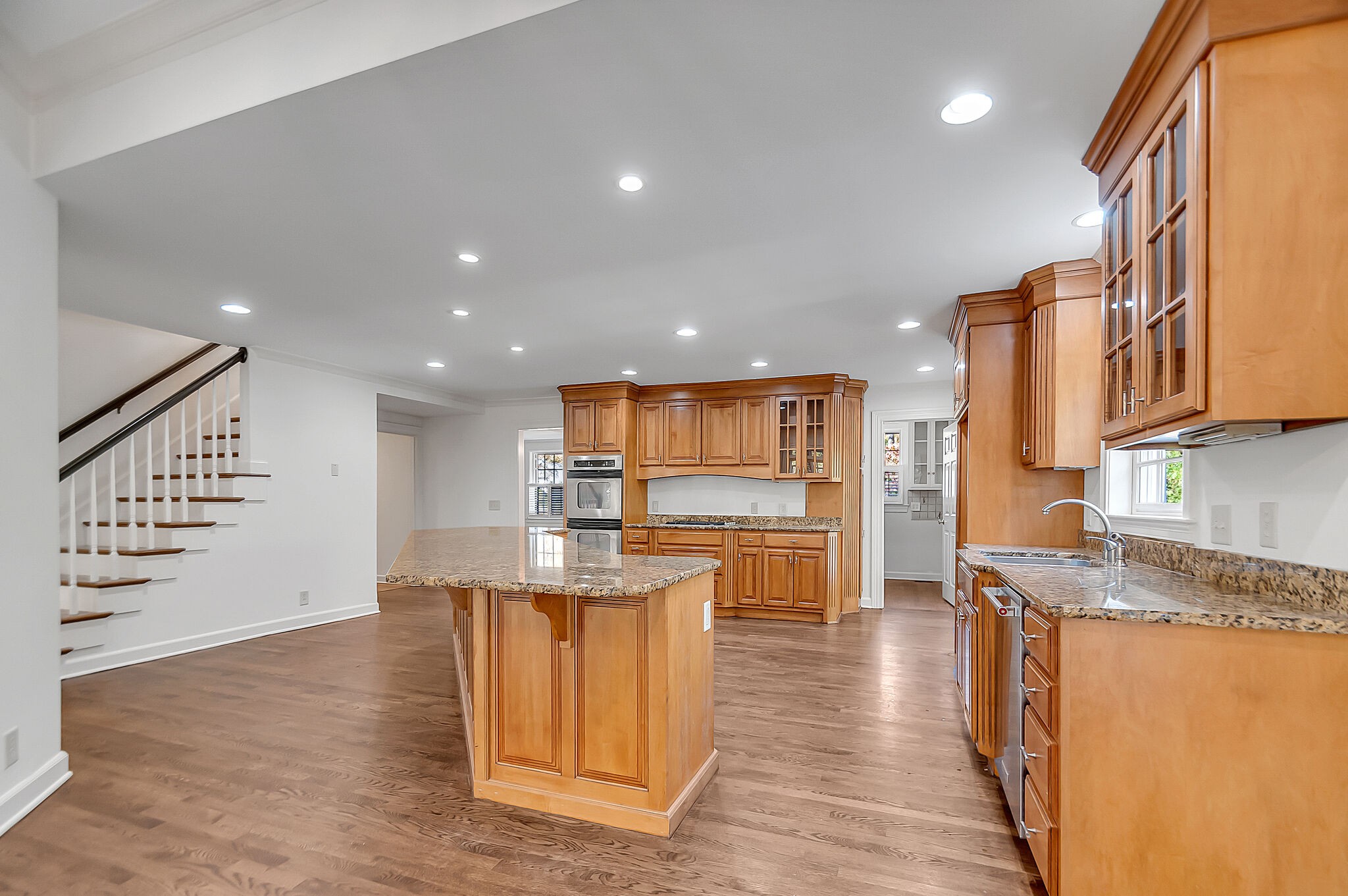 4206 Sneed Road Nashville, TN 37215 - Photo 11 of 56 a kitchen with stainless steel appliances granite countertop a sink and a stove top oven