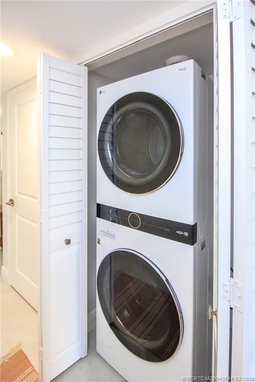 4440 Northeast Sandpebble Trace, Unit 201 Jensen Beach, FL 34957 - Photo 24 of 32 a close up view of a washer and dryer