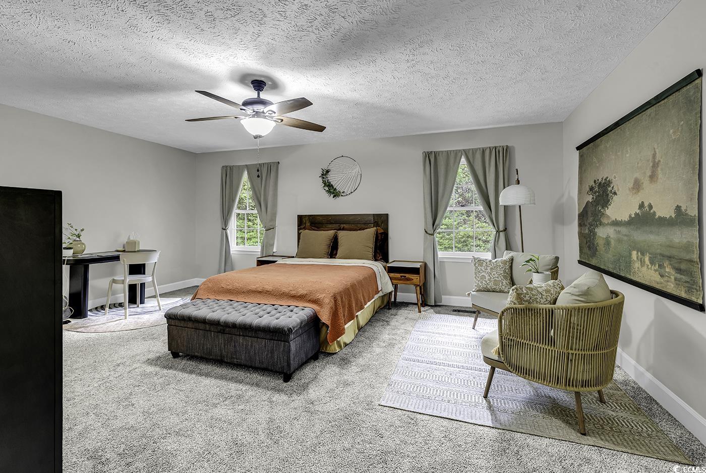 1305 Forest View Road Conway, SC 29526 - Photo 19 of 40 Carpeted bedroom featuring baseboards, ceiling fan, a textured ceiling, and a desk