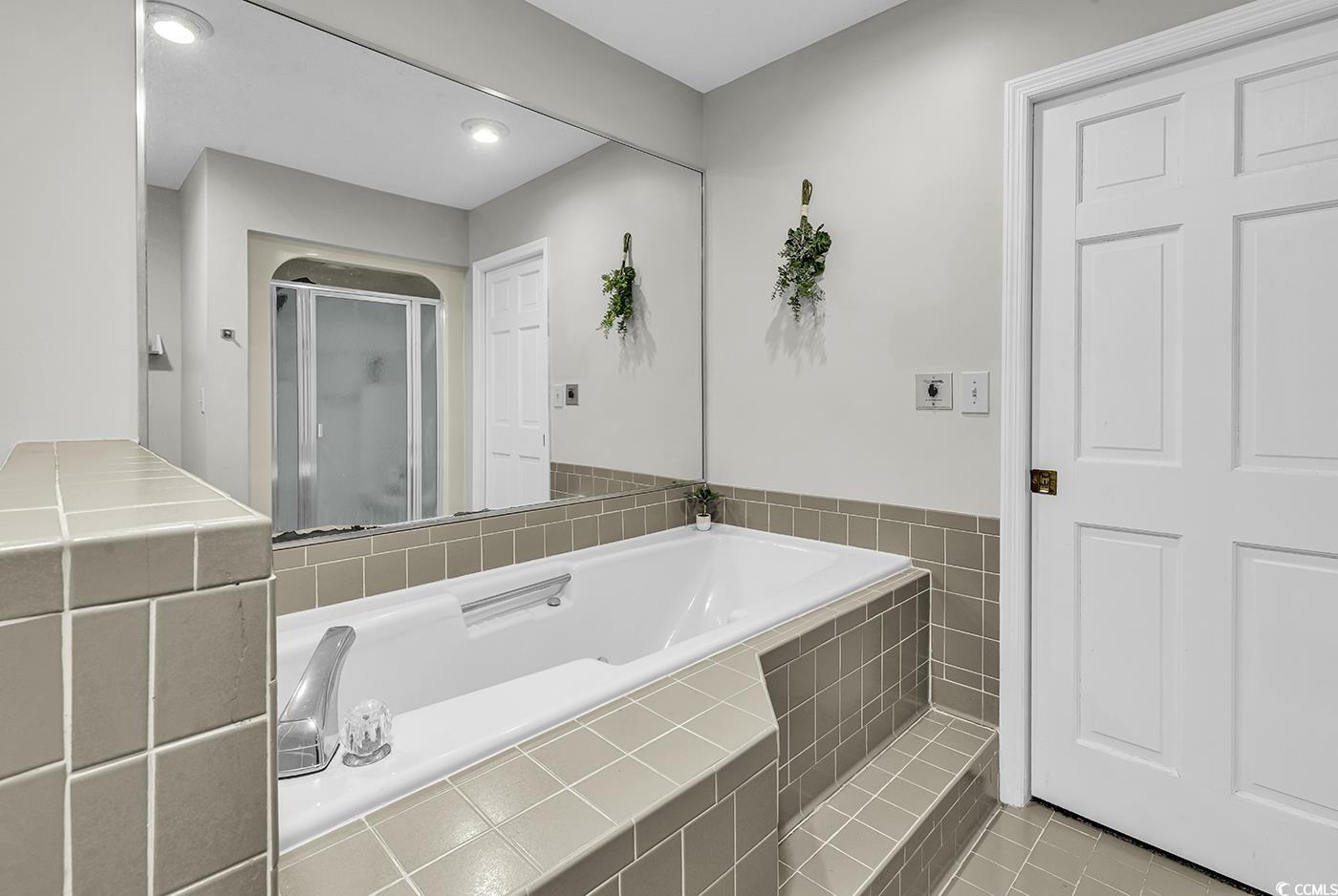 1305 Forest View Road Conway, SC 29526 - Photo 23 of 40 Bathroom featuring a garden tub, a stall shower, tile patterned floors, and recessed lighting