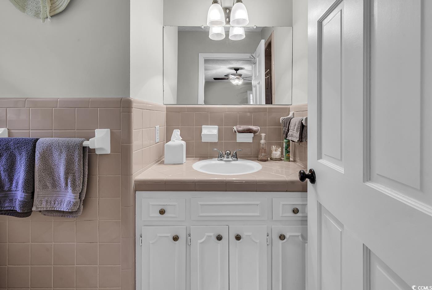1305 Forest View Road Conway, SC 29526 - Photo 30 of 40 Bathroom with vanity, a ceiling fan, and a chandelier