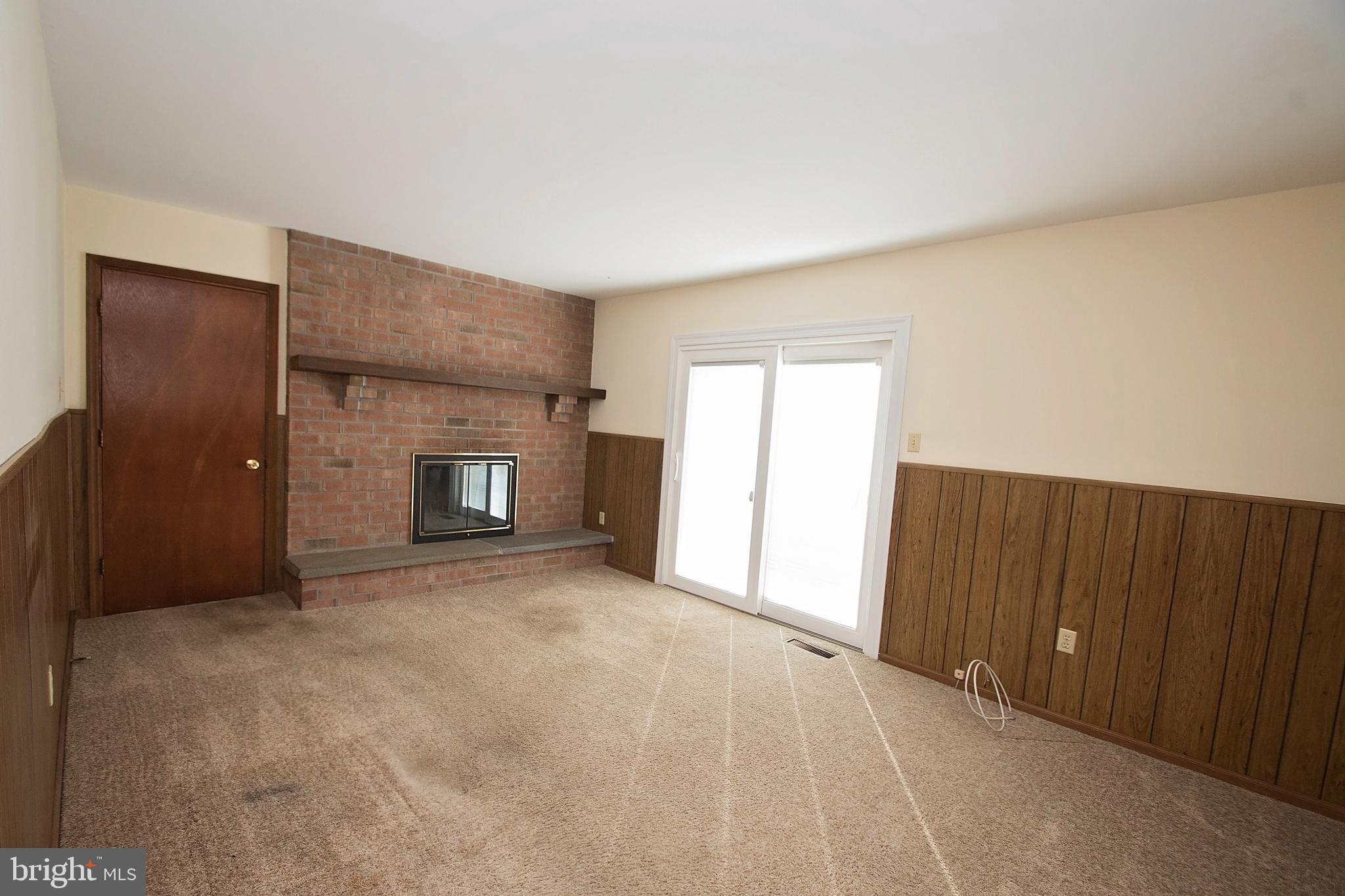 156 Castleton Drive Reading, PA 19607 - Photo 10 of 31 Family Room w/ slider to deck