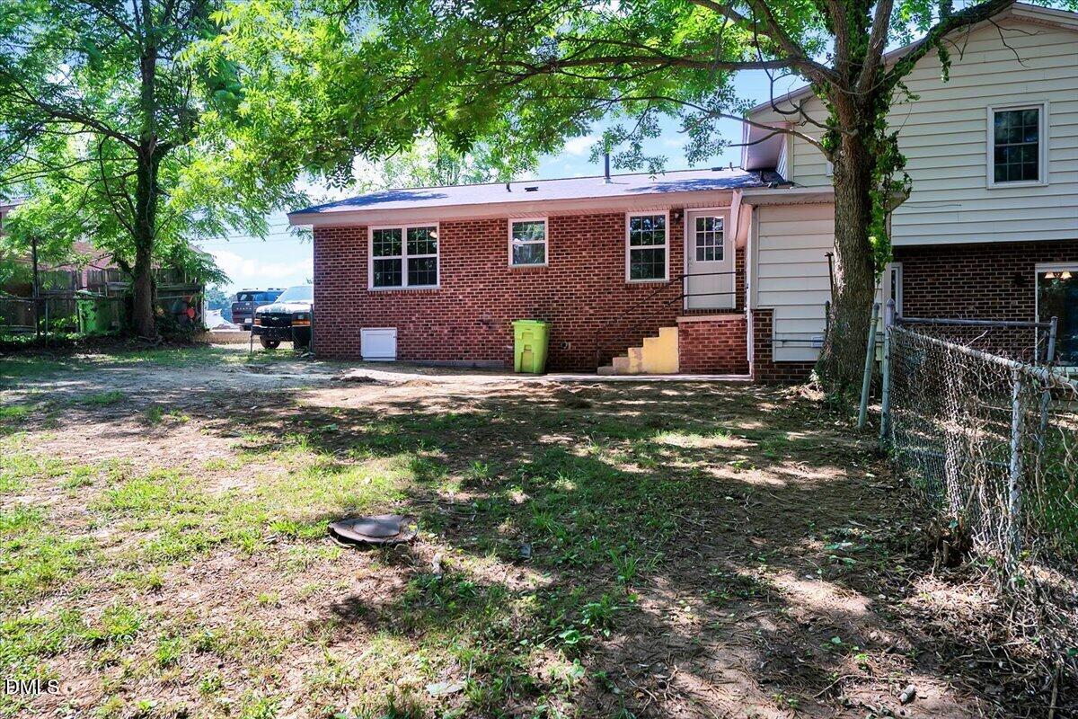 3408 Atlantic Avenue Raleigh, NC 27604 - Photo 18 of 48 a view of a house with backyard and sitting area