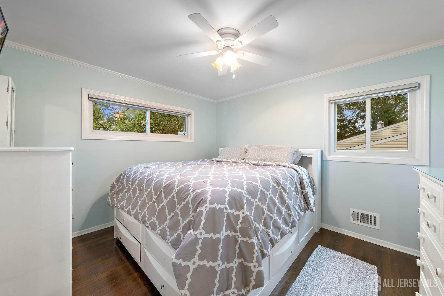 8 Beverly Drive Old Bridge, NJ 08857 - Photo 12 of 34 a bedroom with a bed and a window