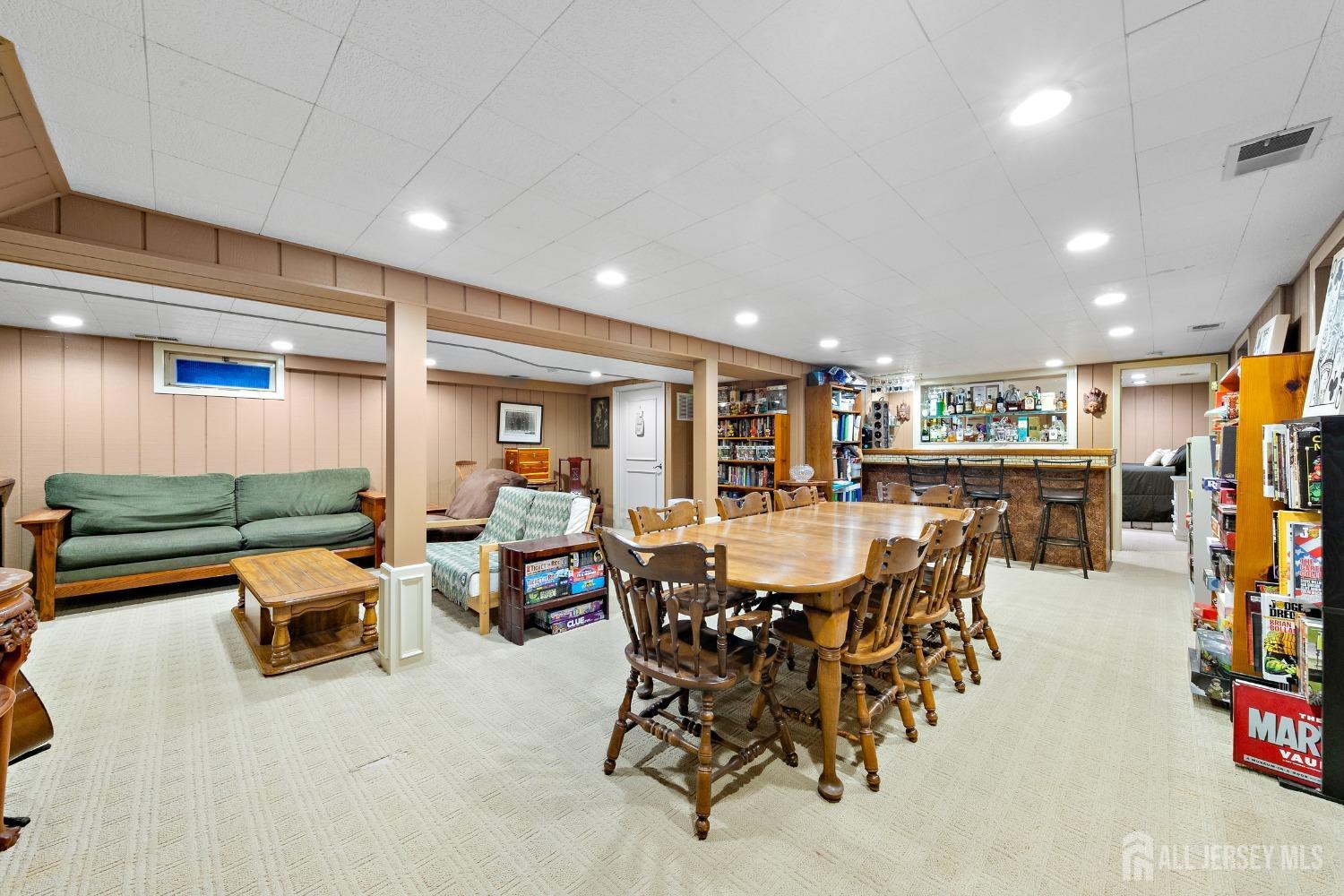 8 Beverly Drive Old Bridge, NJ 08857 - Photo 19 of 34 a group of people sitting at living room