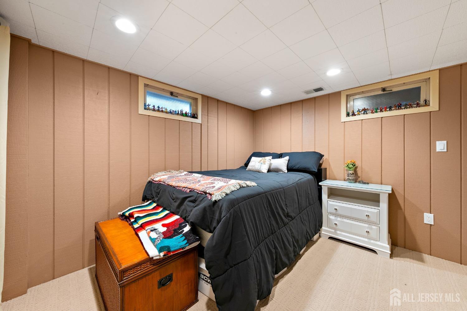 8 Beverly Drive Old Bridge, NJ 08857 - Photo 22 of 34 a bedroom with a bed and a dresser