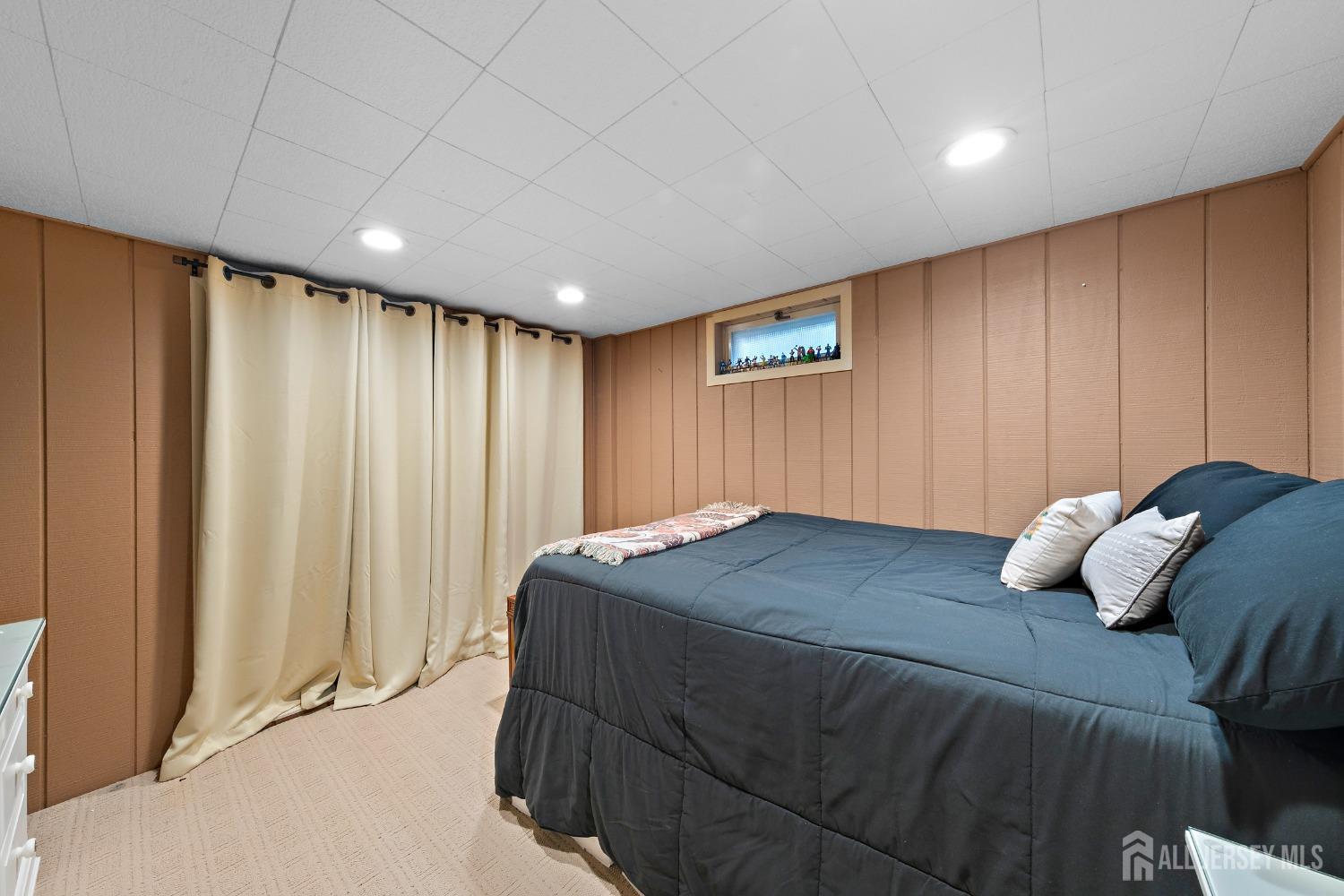 8 Beverly Drive Old Bridge, NJ 08857 - Photo 23 of 34 a bedroom with a bed and a closet