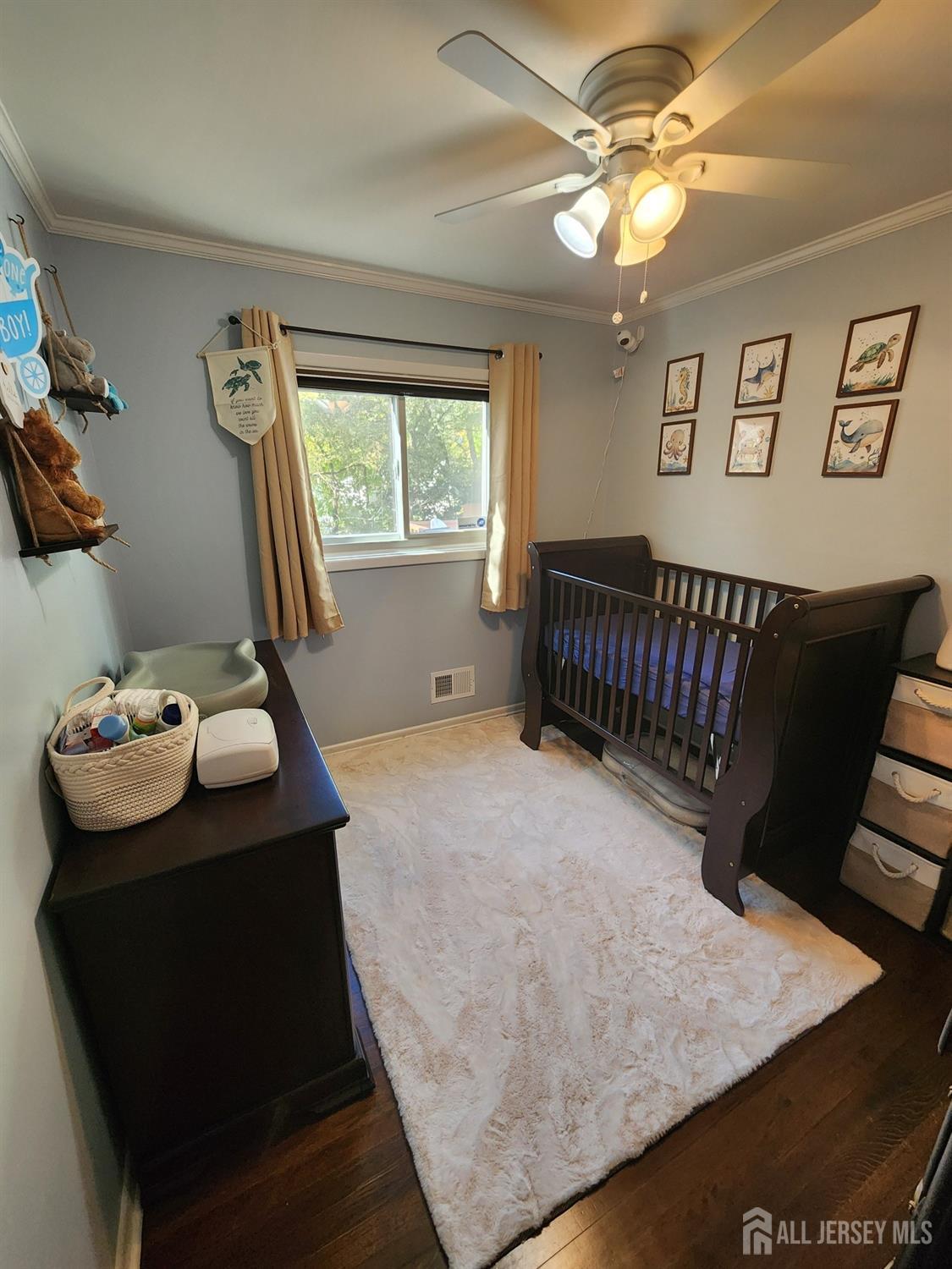 8 Beverly Drive Old Bridge, NJ 08857 - Photo 28 of 34 a room with furniture and window