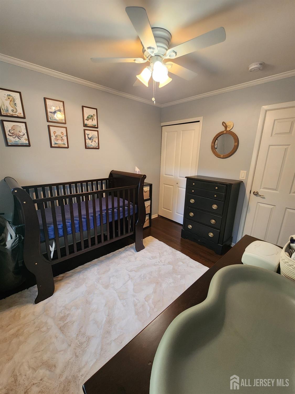 8 Beverly Drive Old Bridge, NJ 08857 - Photo 29 of 34 a bedroom with a bed and a dresser