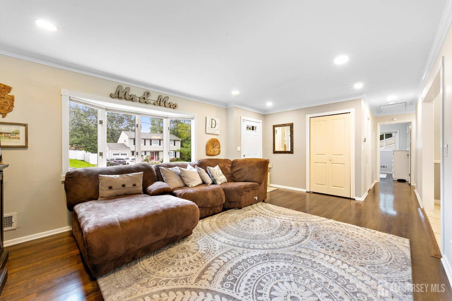 8 Beverly Drive Old Bridge, NJ 08857 - Photo 3 of 34 a living room with furniture and a large window