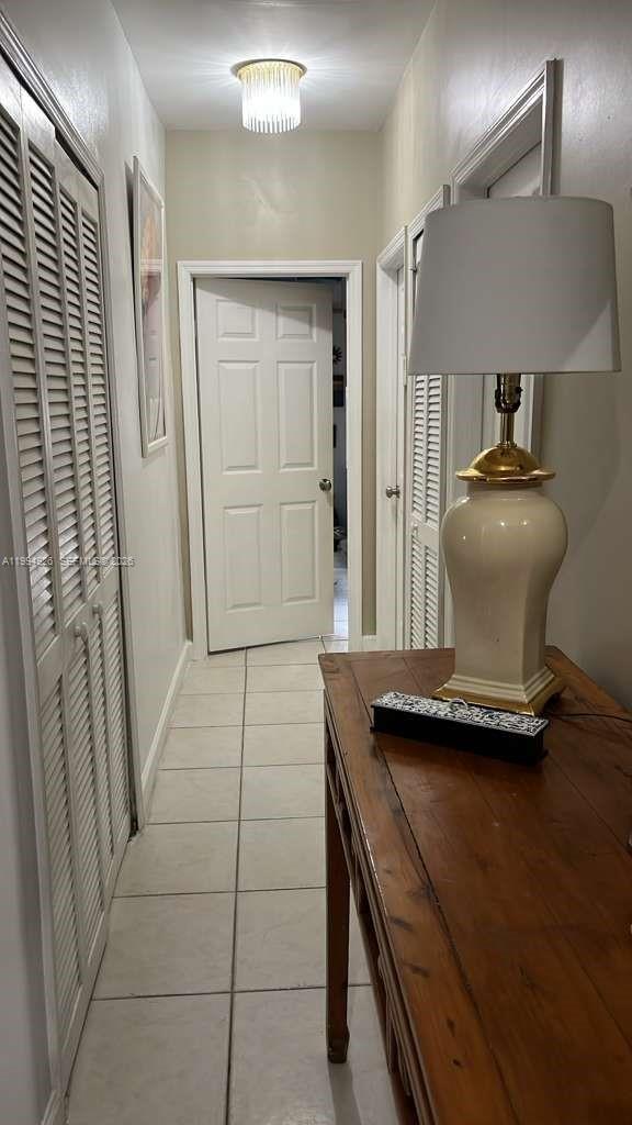 656 Northwest 129th Place Miami, FL 33182 - Photo 14 of 36 a view of a hallway with seating area