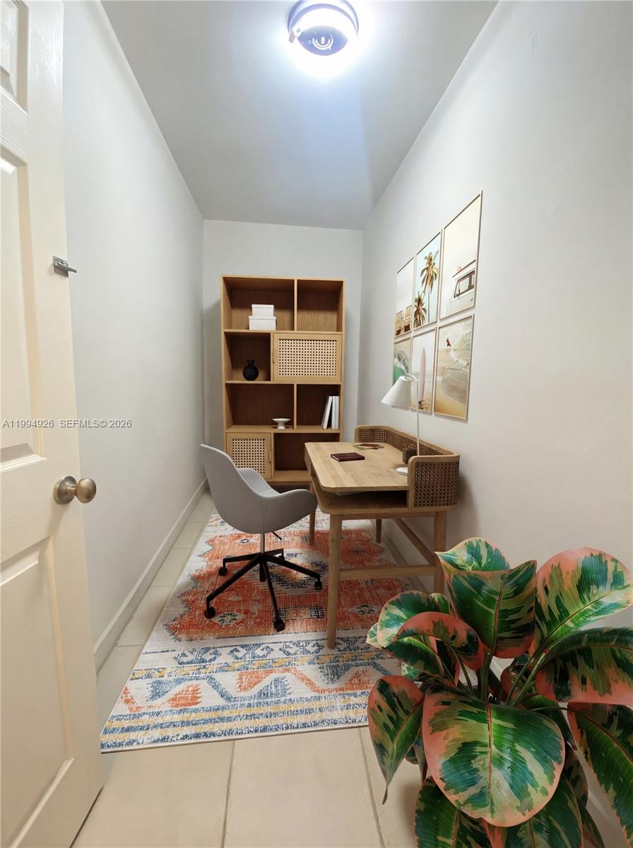 656 Northwest 129th Place Miami, FL 33182 - Photo 30 of 36 a living room with furniture and a potted plant