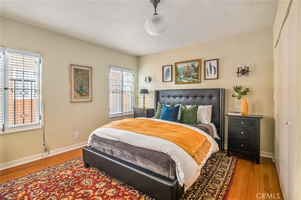 8246 4th Street Los Angeles, CA 90048 - Photo 29 of 38 a bedroom with a bed and a fireplace