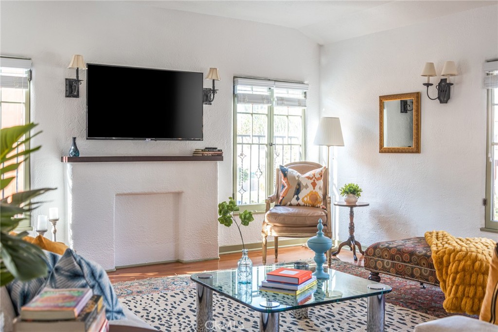 8246 4th Street Los Angeles, CA 90048 - Photo 6 of 38 a living room with furniture and a flat screen tv
