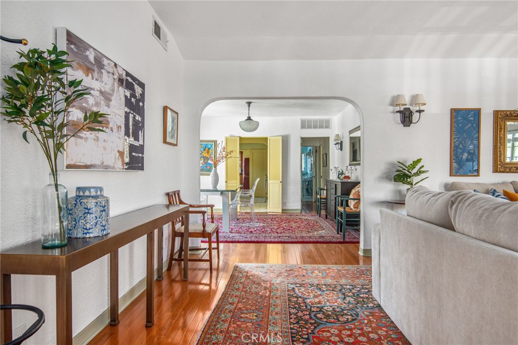 8246 4th Street Los Angeles, CA 90048 - Photo 7 of 38 a living room with furniture and a rug