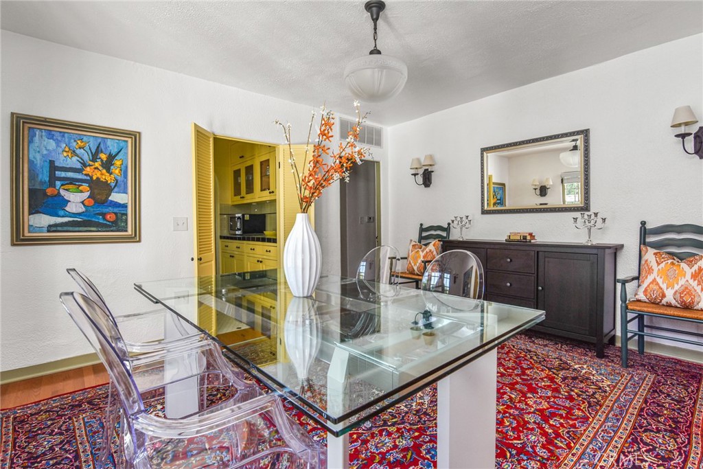 8246 4th Street Los Angeles, CA 90048 - Photo 9 of 38 a living room with dining table