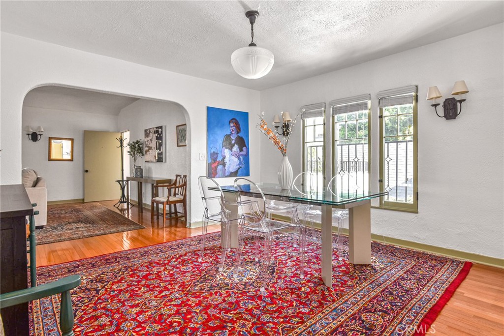 8246 4th Street Los Angeles, CA 90048 - Photo 10 of 38 a living room with furniture and a rug