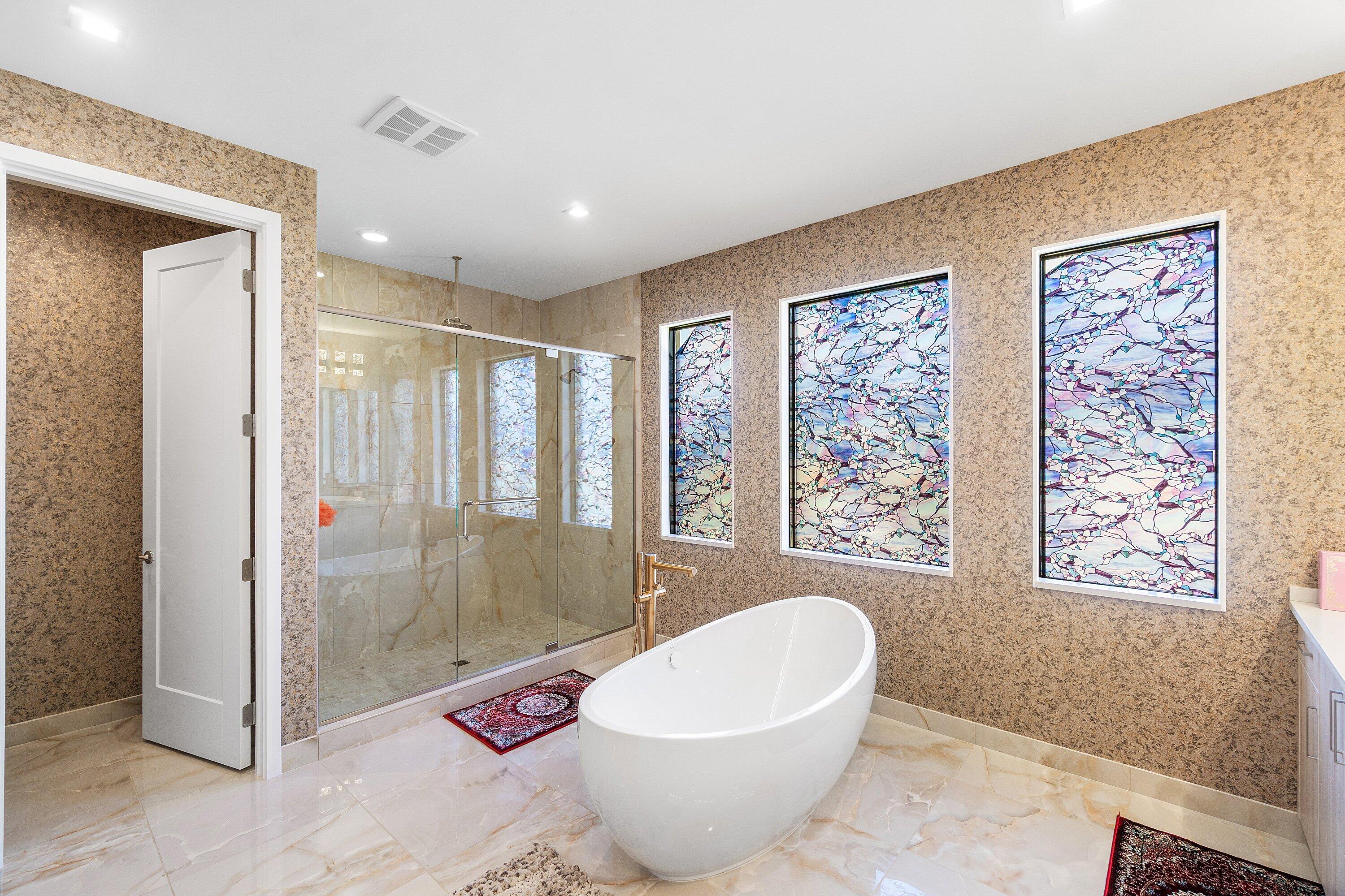 8233 Crystal Downs Avenue Boca Raton, FL 33434 - Photo 37 of 58 a spacious bathroom with a large tub and shower