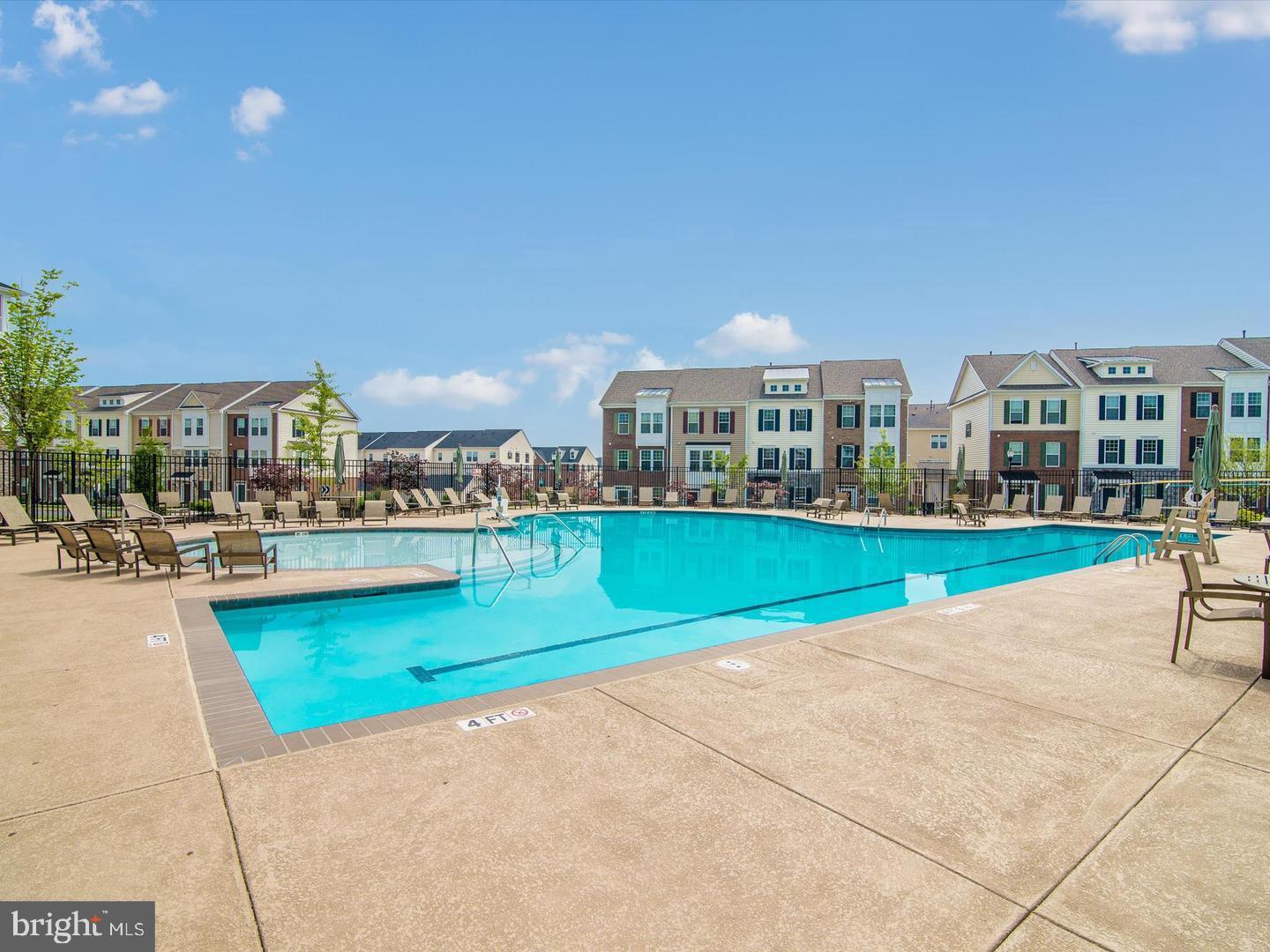 208 B Mill Pond Road Frederick, MD 21701 - Photo 38 of 45 a view of swimming pool and outdoor seating