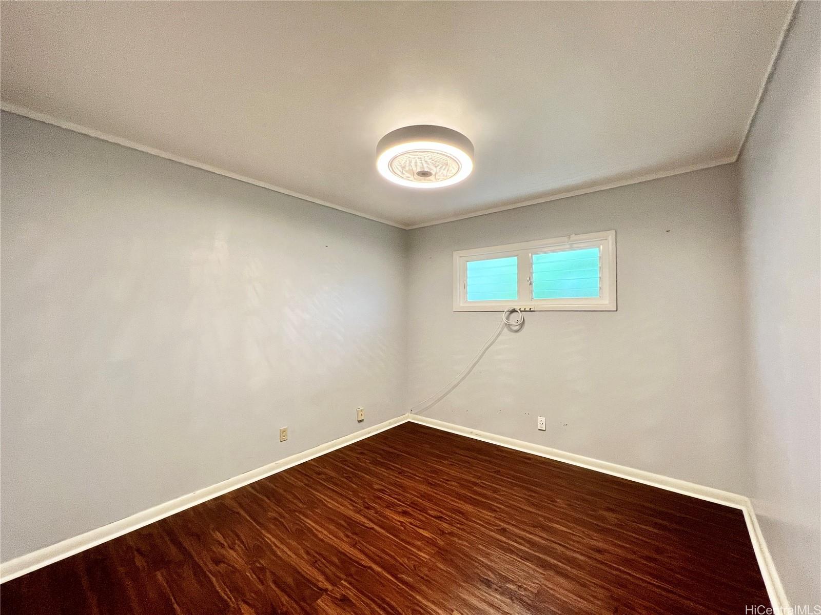 11 Haumalu Place Wahiawa, HI 96786 - Photo 8 of 15 a view of a room with wooden floor and window