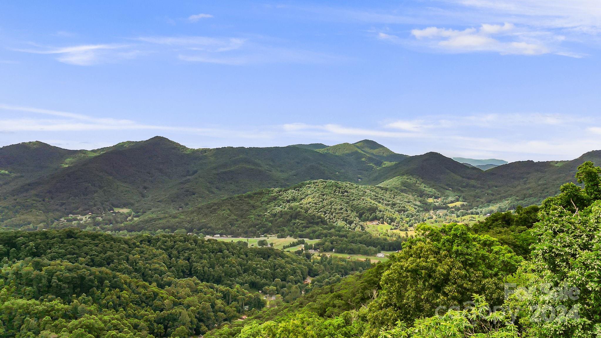 158 Sugar Cove Road Weaverville, NC 28787 - Photo 2 of 48 a view of mountains and valleys
