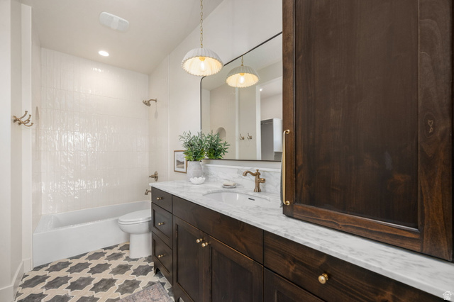 4871 South Homestead Way Washington, UT 84780 - Photo 74 of 151 Bathroom with vanity, shower / bathtub combination, and recessed lighting
