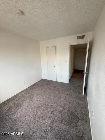 an empty room with a natural light