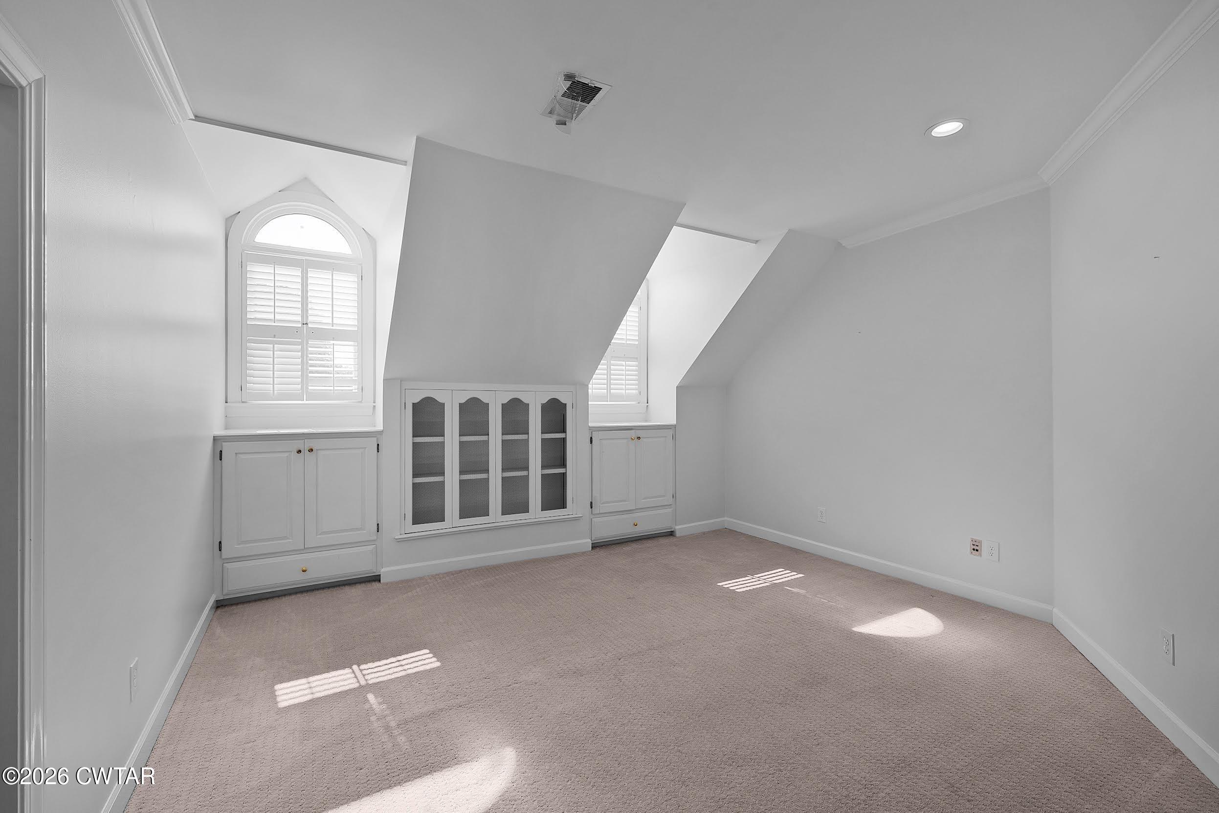 58 Huntington Place Jackson, TN 38305 - Photo 37 of 38 an empty room with windows