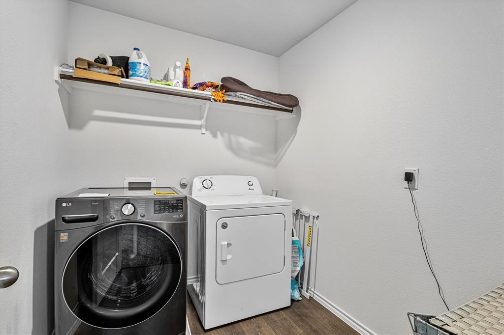 1231 Delmita Drive Forney, TX 75126 - Photo 19 of 38 a utility room with dryer and washer