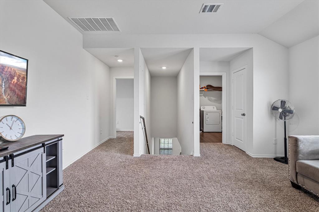 1231 Delmita Drive Forney, TX 75126 - Photo 21 of 38 a view of a livingroom with a dinning area