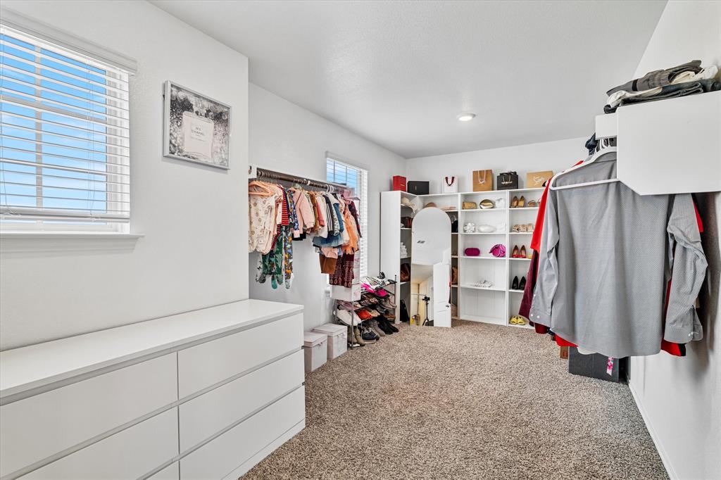 1231 Delmita Drive Forney, TX 75126 - Photo 28 of 38 a view of a room with gym equipment