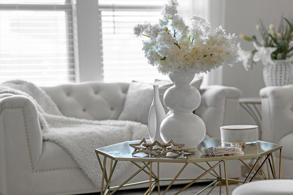 1231 Delmita Drive Forney, TX 75126 - Photo 8 of 38 a dining room with furniture and a chandelier