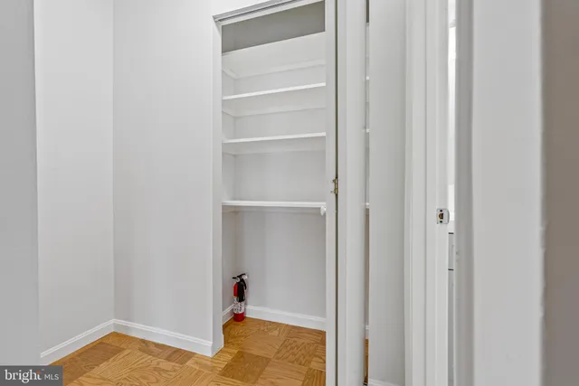 a view of a room with rack on the wall