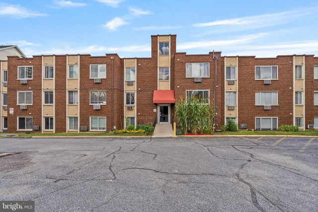 a front view of a building with street