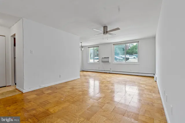 a view of an empty room with a window
