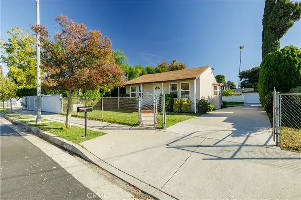 a view of house with outdoor space and street view