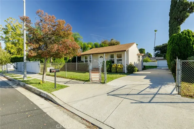 a view of house with outdoor space and street view