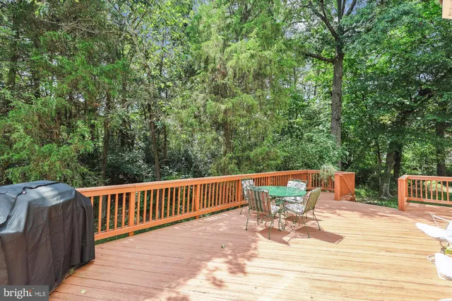 a view of a chairs and table on the wooden floor