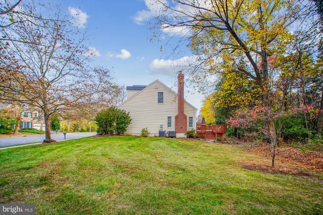 a huge green field with lots of trees