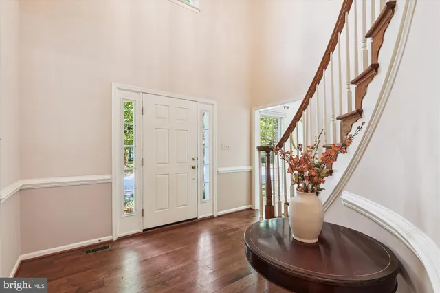 a view of entryway with wooden floor