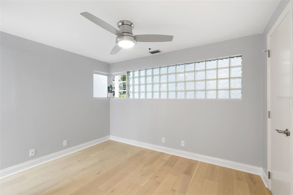 4950 Bayshore Boulevard, Unit 23 Tampa, FL 33611 - Photo 15 of 40 a view of an empty room with a window