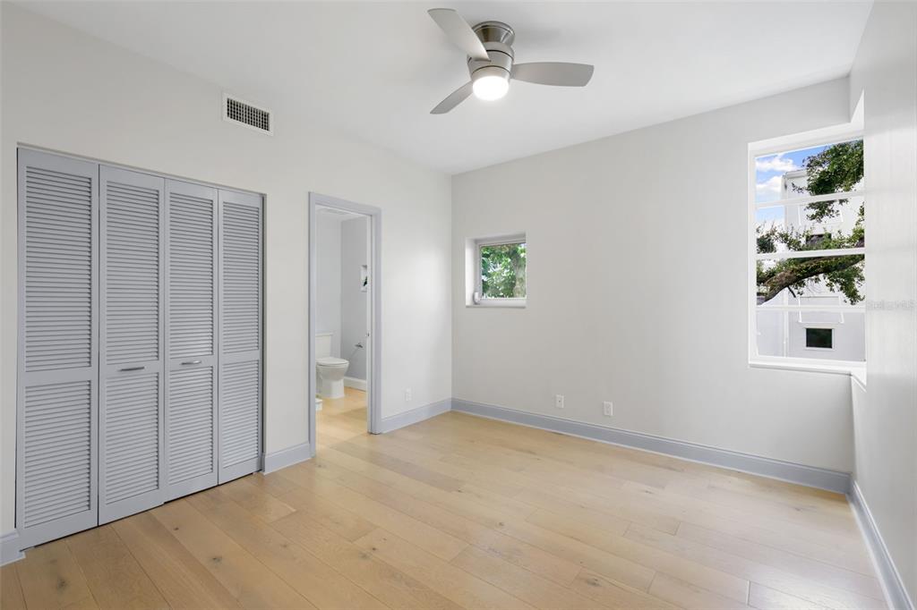 4950 Bayshore Boulevard, Unit 23 Tampa, FL 33611 - Photo 19 of 40 a view of an empty room with a window