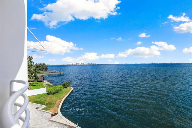 a view of a golf course with outside space