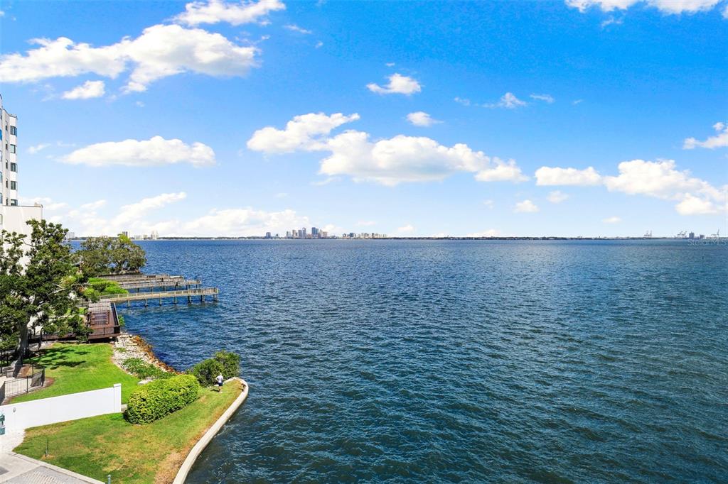 4950 Bayshore Boulevard, Unit 23 Tampa, FL 33611 - Photo 35 of 40 a view of a lake with a building in the background